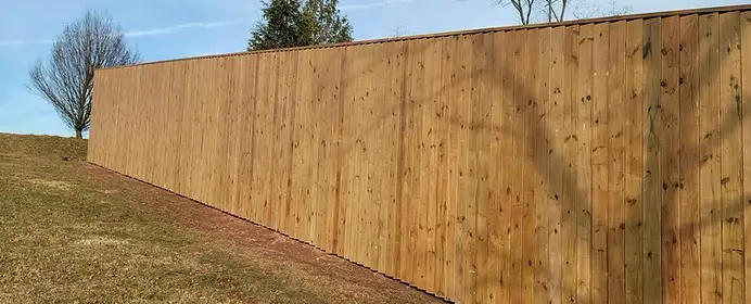 Stained Wood Fence by Stauffer Brothers